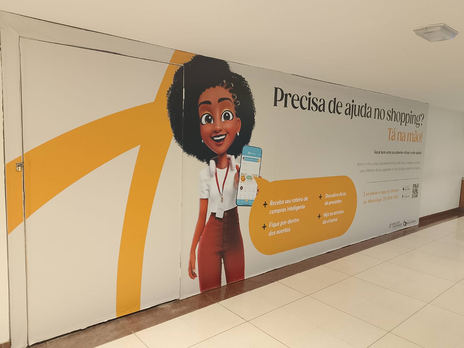 Tapume Ancar Ivanhoe — campanha institucional Ana com ilustração em grande formato