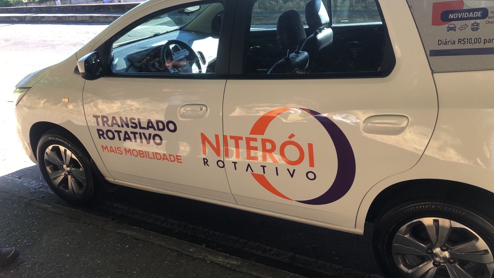Envelopamento de frota Niterói Rotativo — adesivação institucional